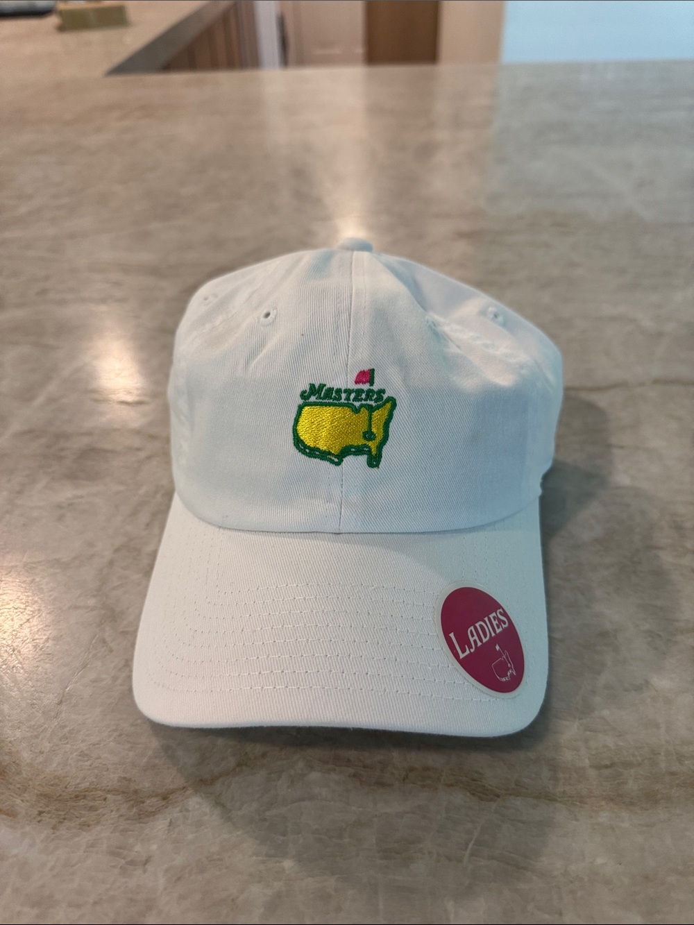 Masters White Cap with Green and Yellow Map Logo and Pink Flag Accent